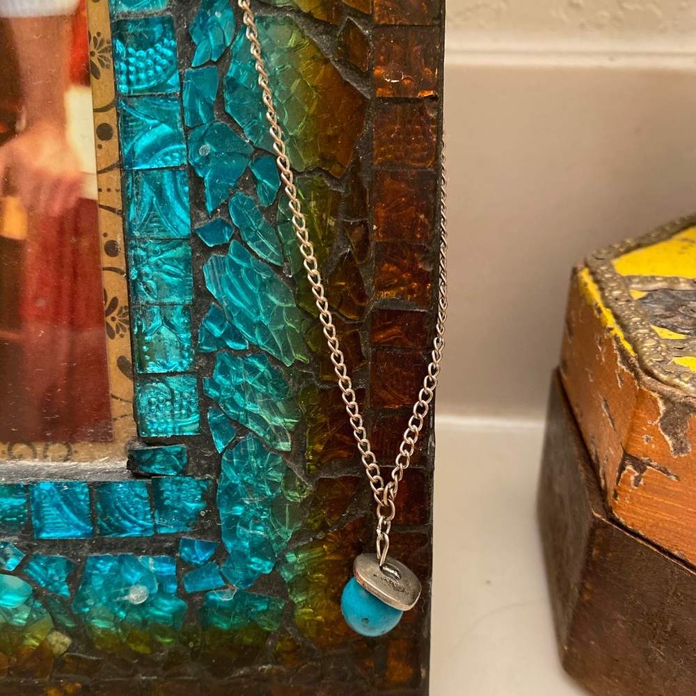 Necklace turquoise with metal.